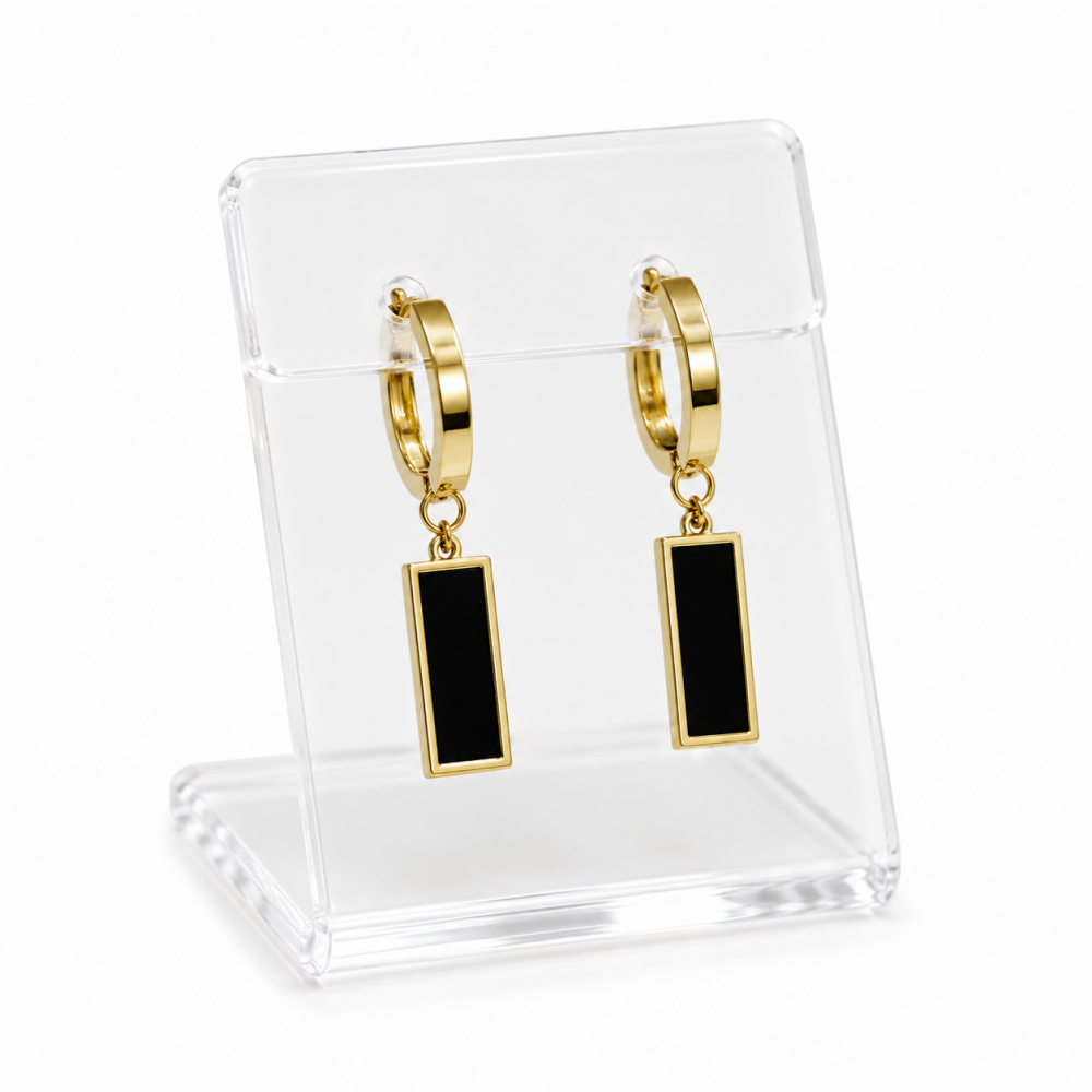 Earrings with a black stone