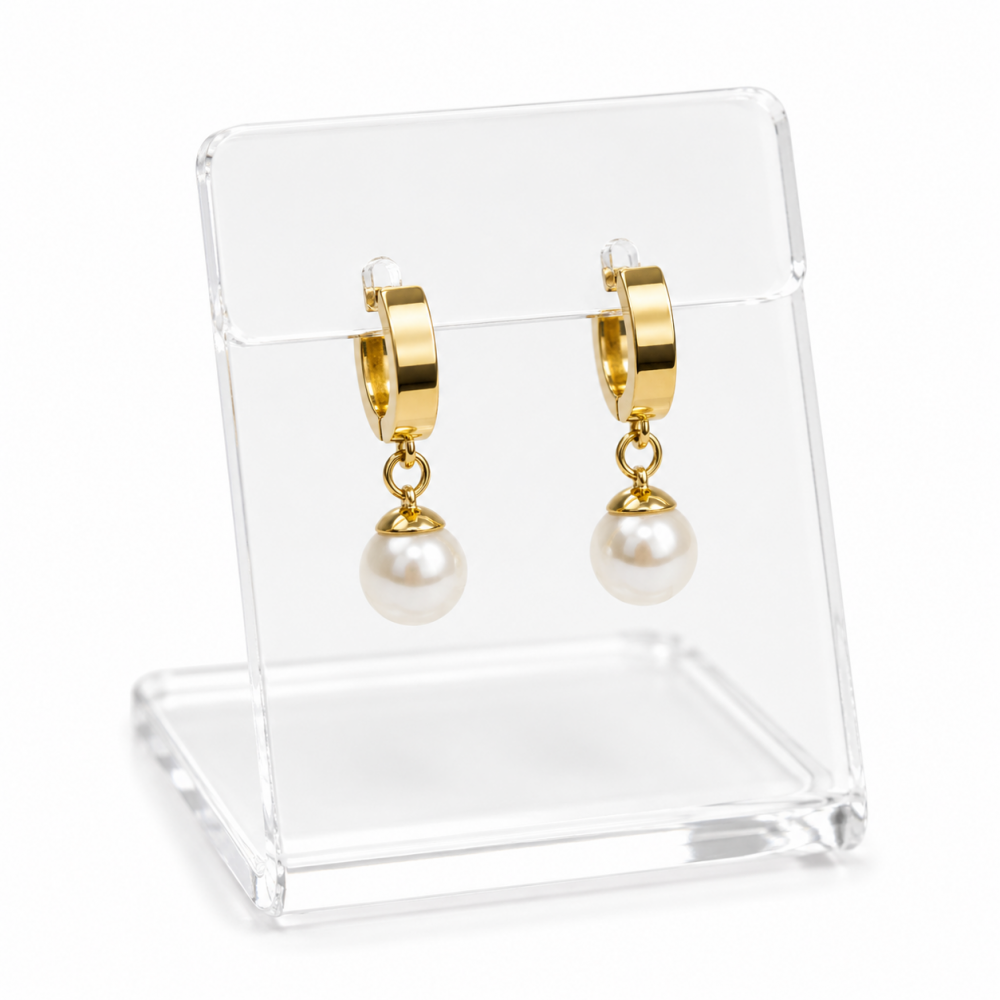 Earrings with a faux pearl