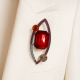 Brooch with red stone (6897)