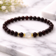 Bracelet made of Garnet, Moonstone and Hematite